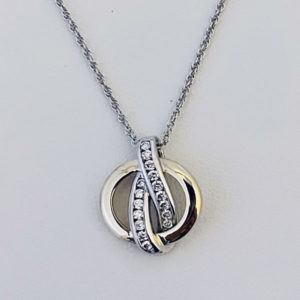 Two tone diamond circle pendant